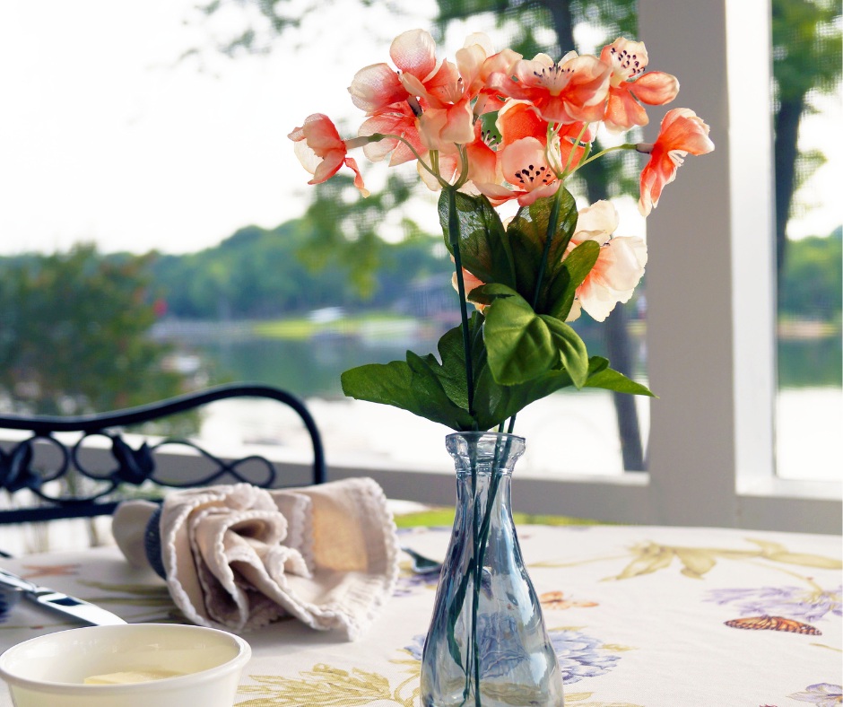 vase of flowers on a table outside