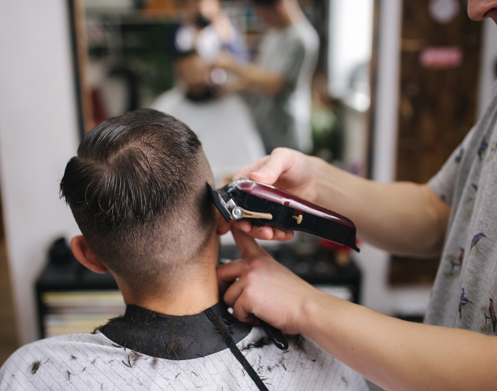 a man getting a hair cut